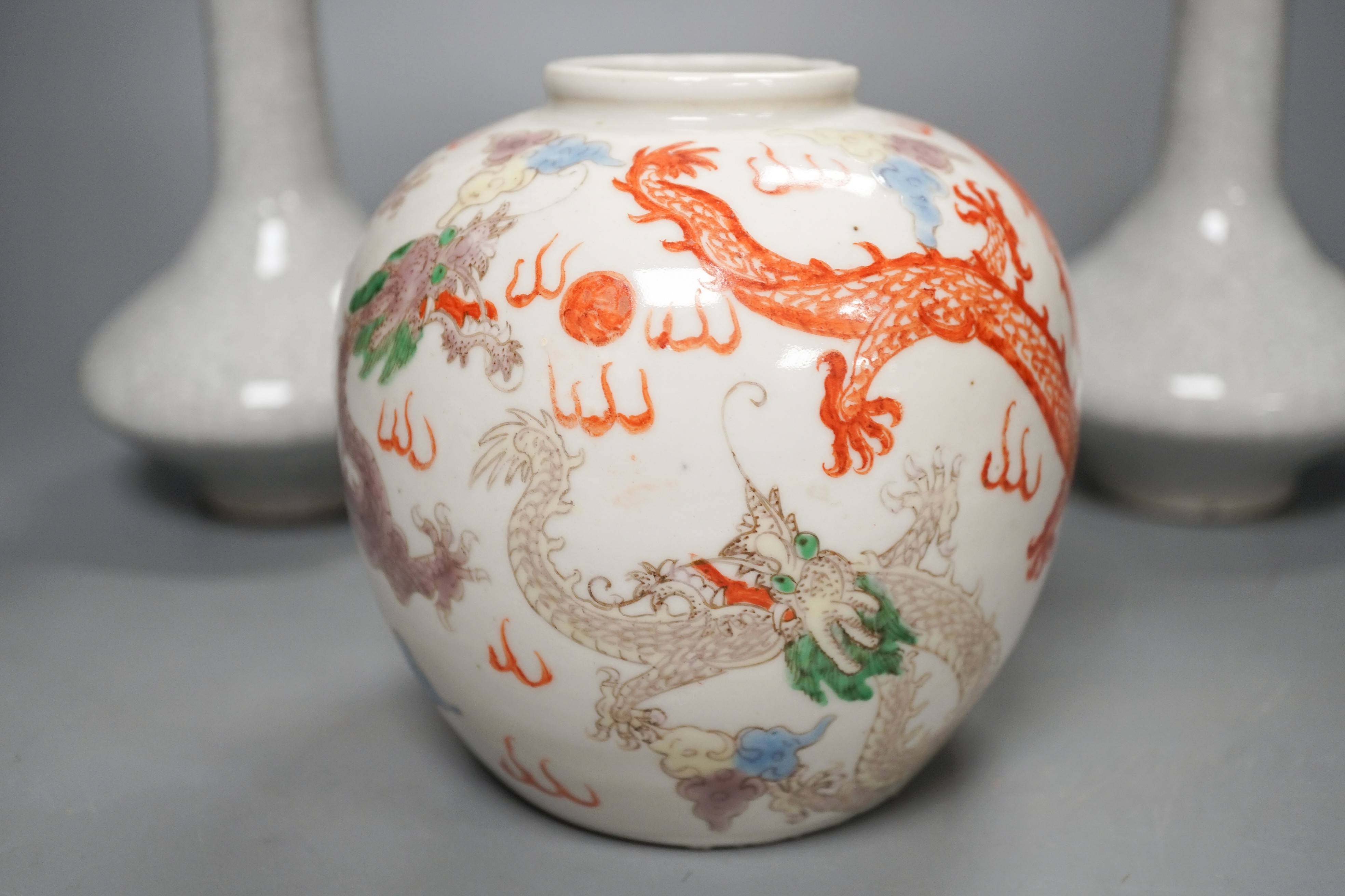 A Chinese enamelled porcelain 'dragon' jar and two crackleglaze bottle vases, tallest 19cm